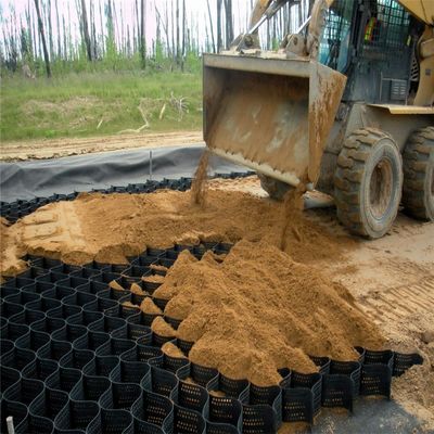 Gelbe Geozelle für die Verstärkung der Schotterverstärkung und der Aufbau von Stützmauern